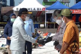 Disaksikan Jokowi, Jasa Raharja serahkan santunan korban SJ-182