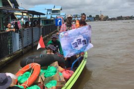 LLDIKTI Wilayah XI bergerak bersama 49 PTS Kalimantan bantu korban banjir
