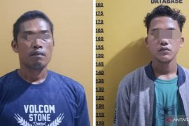 Polisi ringkus dua bandar togel sedang merekap data