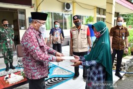 400 KK masih terendam di Kalumpang, bantuan papan dan balokan diserahkan