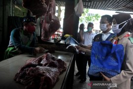 Sosialisasi Penegakan protokol kesehatan di pasar