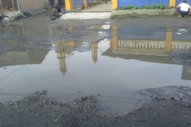 Pemuda Muhammadiyah Tanjung Pura minta Bupati Langkat perbaiki jalan rusak