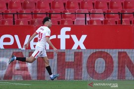 Munir El Haddadi antar Sevilla kalahkan Huesca 1-0