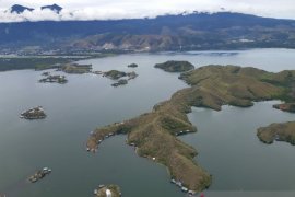 SPEKTRUM-Otsus dan peningkatan kualitas hidup orang asli Papua