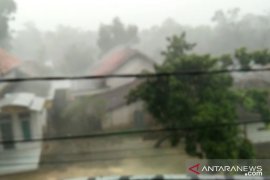 Flood, whirlwind hit Pamekasan