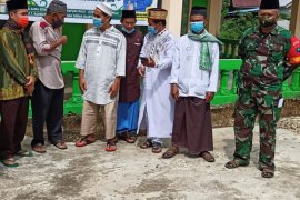 Satgas TMMD hadiri acara Israk Mikraj menerapkan Protkes di Pengkadan