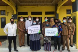 BPJAMSOSTEK Cabang Pekanbaru bayarkan santunan Rp85,4 juta perangkat Desa Ukui