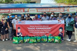 Alfamidi berbagi bersama FJM