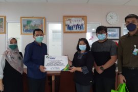 BP Jamsostek serahkan santunan kematian mantan Praeses HKBP