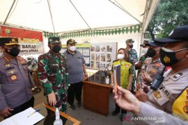 Bhabinkamtibmas wajib  bawa buku pedoman kontinjensi COVID-19