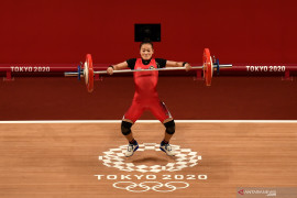 Indonesia sabet medali pertama Olimpiade Tokyo 2020 lewat lifter putri Windy Cantika Aisah Page 1 Small