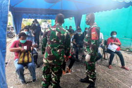 Kodim 1710/Mimika lanjutkan layanan serbuan vaksinasi COVID-19 untuk warga