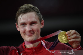 Axelsen geser Momota di peringkat satu dunia tunggal putra