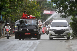 Atasi COVID-19 dengan Penyemprotan Disinfektan Page 1 Small