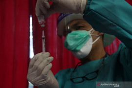 Vaksinasi versus agama