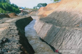 Open channel pengelolaan limbah PT AGM dan KUD Karya Murni selesai 100 persen