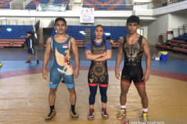 Tiga bersaudara jadi tumpuan gulat Kaltim raih emas PON Papua