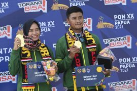 PON Papua: Diananda-Riau Ega berjaya di panahan recurve campuran