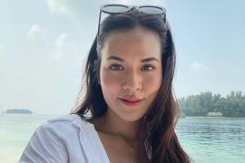 Raisa duet bareng penyanyi Korea Selatan Sam Kim di "Someday"