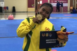 PON Papua - Tim Kaltim dan Jabar berbagi medali emas nomor embu berpasangan