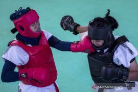 Pertarungan Atlet Sumbar Pada Semi Final Tarung Derajat 54,1-58 Kg  PON Papua