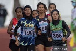 Pelari Sumatera Utara Agustina Mahardi  Raih Medali Emas Lomba Lari Putri 1.500 Meter  PON Papua Page 1 Small