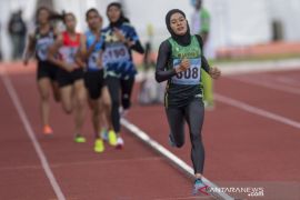 Pelari Sumatera Utara Agustina Mahardi  Raih Medali Emas Lomba Lari Putri 1.500 Meter  PON Papua Page 2 Small