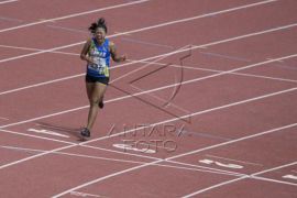 Final lari 400 meter putri T+54 Peparnas XVI Papua Page 1 Small