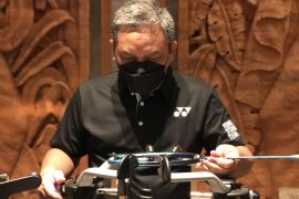 Cerita Taufik yang menukangi senar raket dari Senayan hingga Olimpiade