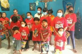 Young Buddhist Association rayakan Natal bersama mahasiswa Katolik dan anak yatim piatu