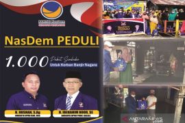 Anggota DPRD HSS dan provinsi NasDem bagikan 1.000 paket sembako di Daha