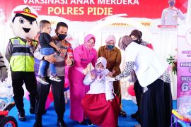Ini Anak umur 6-11 tahun pertama di vaksinasi di Pidie