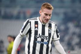 Dejan Kulusevki symringah gabung dengan Tottenham Hotspur