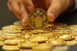 Harga emas terdongkrak 14,7 dolar didorong kekhawatiran inflasi dan Ukraina