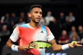 Auger-Aliassime mundur  dari Dubai karena cedera punggung