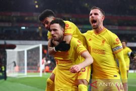 Liverpool tempel ketat Manchester City setelah menang atas Arsenal 2-0