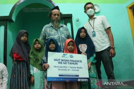 Penyerahan Bantuan CSR WOM FInance