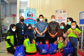 Hari Down Syndrome Sedunia, WOM Finance berbagi dengan anak berkebutuhan khusus