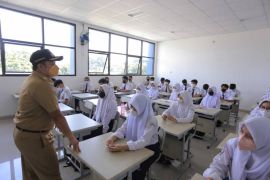 PTM dengan  kapasitas 100 persen di Kota Tangerang mulai dilaksanakan