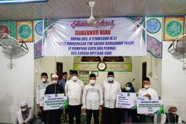 Safari Ramadhan Gubri, BP Jamsostek Siak serahkan bantuan dan santunan