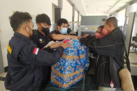 Melihat aktivitas PLBN Entikong sambut kepulangan pekerja migran