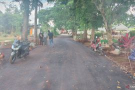 Warga bersyukur H Iriansyah aspal jalan Taman Makam Muslimin Pelaihari