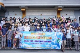 100 anak yatim piatu diajak nobar Satria Dewa Gatotkaca