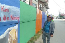 Disperkimtan Tanah Bumbu percantik perkotaan dengan lukisan