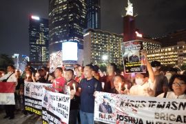 Aksi 1.000 lilin untuk Brigadir J di Bundaran HI