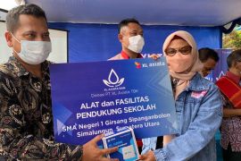 Karyawan XL Axiata Berbagi dan Mengajar di Kawasan Danau Toba