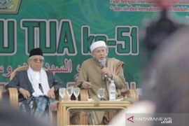 Status pendiri Alkhairaat adalah WNI