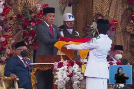 Flag lowering ceremony at Merdeka Palace runs smoothly