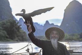 Nelayan Guangxi mulai karier baru sebagai model bagi wisatawan