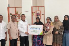 BPJS Ketenagakerjaan salurkan santunan kematian  di Pidie Jaya